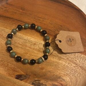 Gold and Black Stretchable Bracelet with Elegant Design